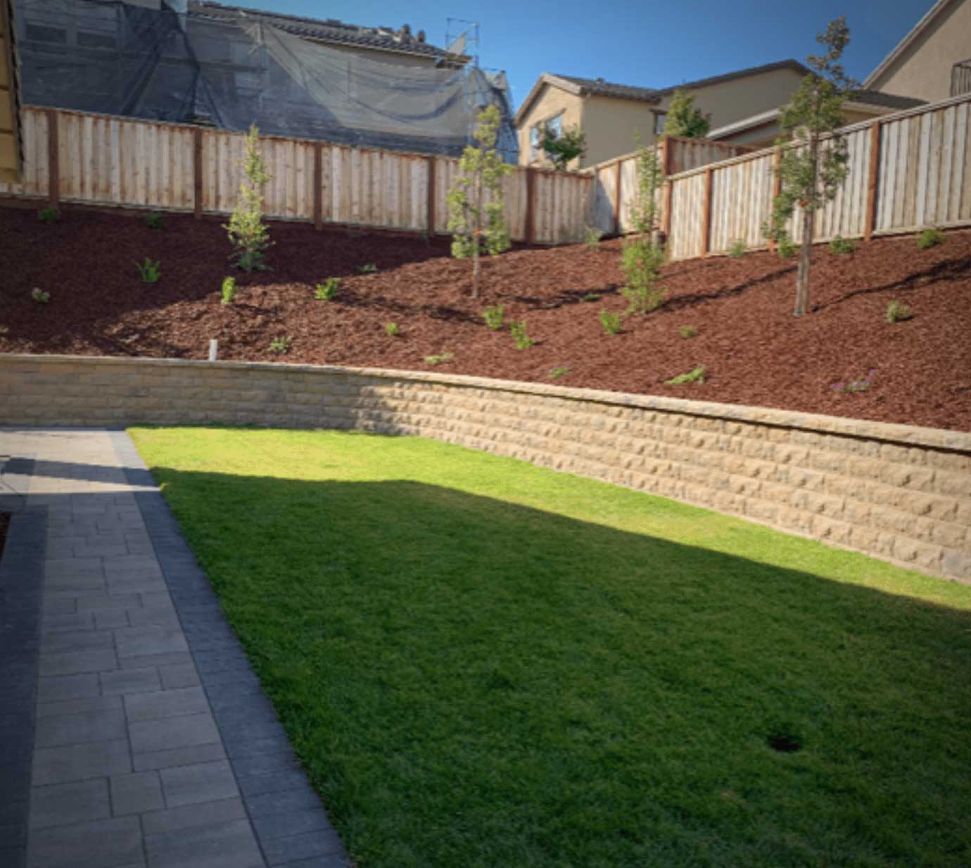 grading-3 Hill and retaining wall grading for optimal drainage | contractor in Newtown, PA