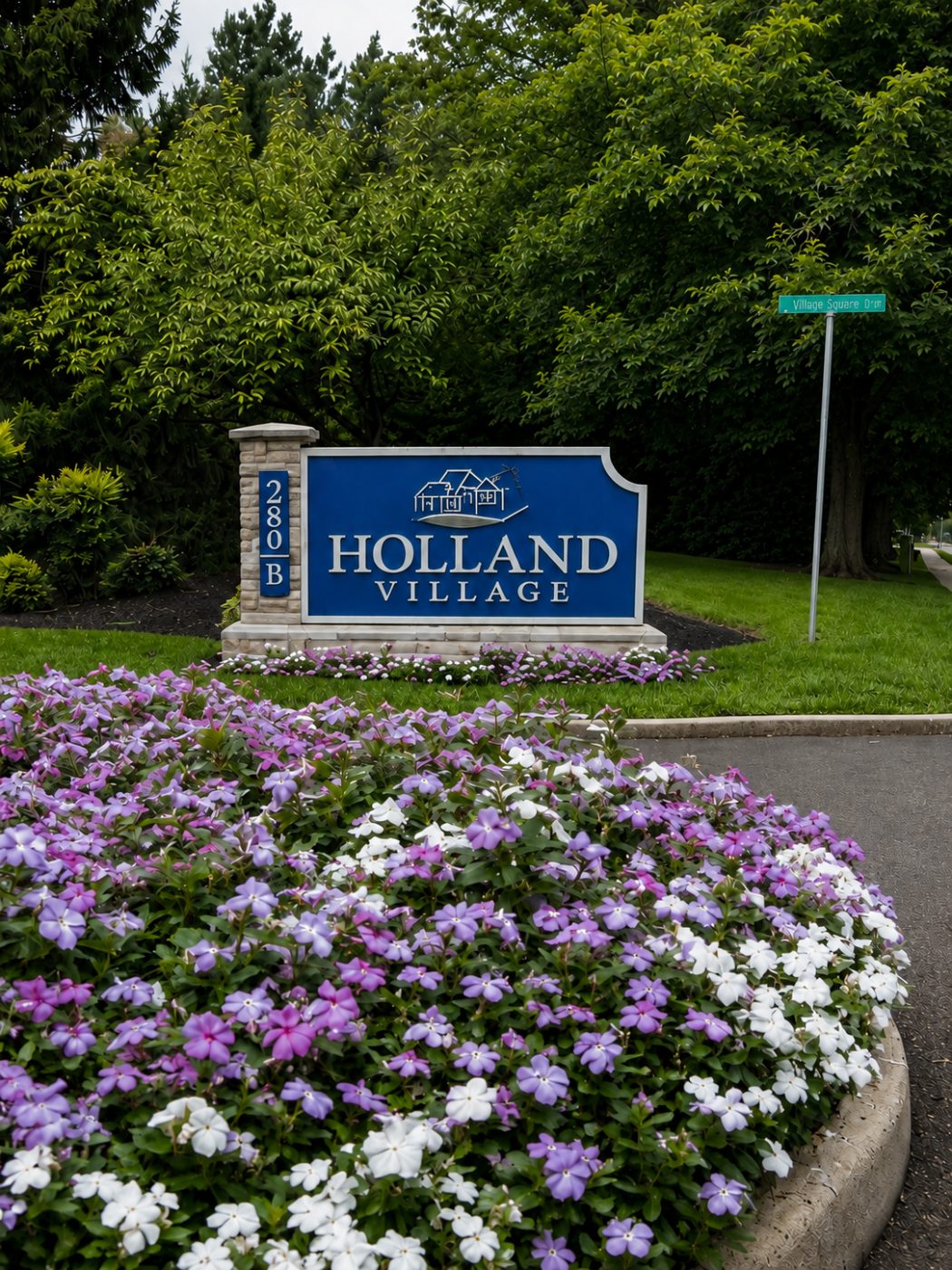 HOLLAND SIGN PIC 2026 Community entrance sign landscaping by Rockport